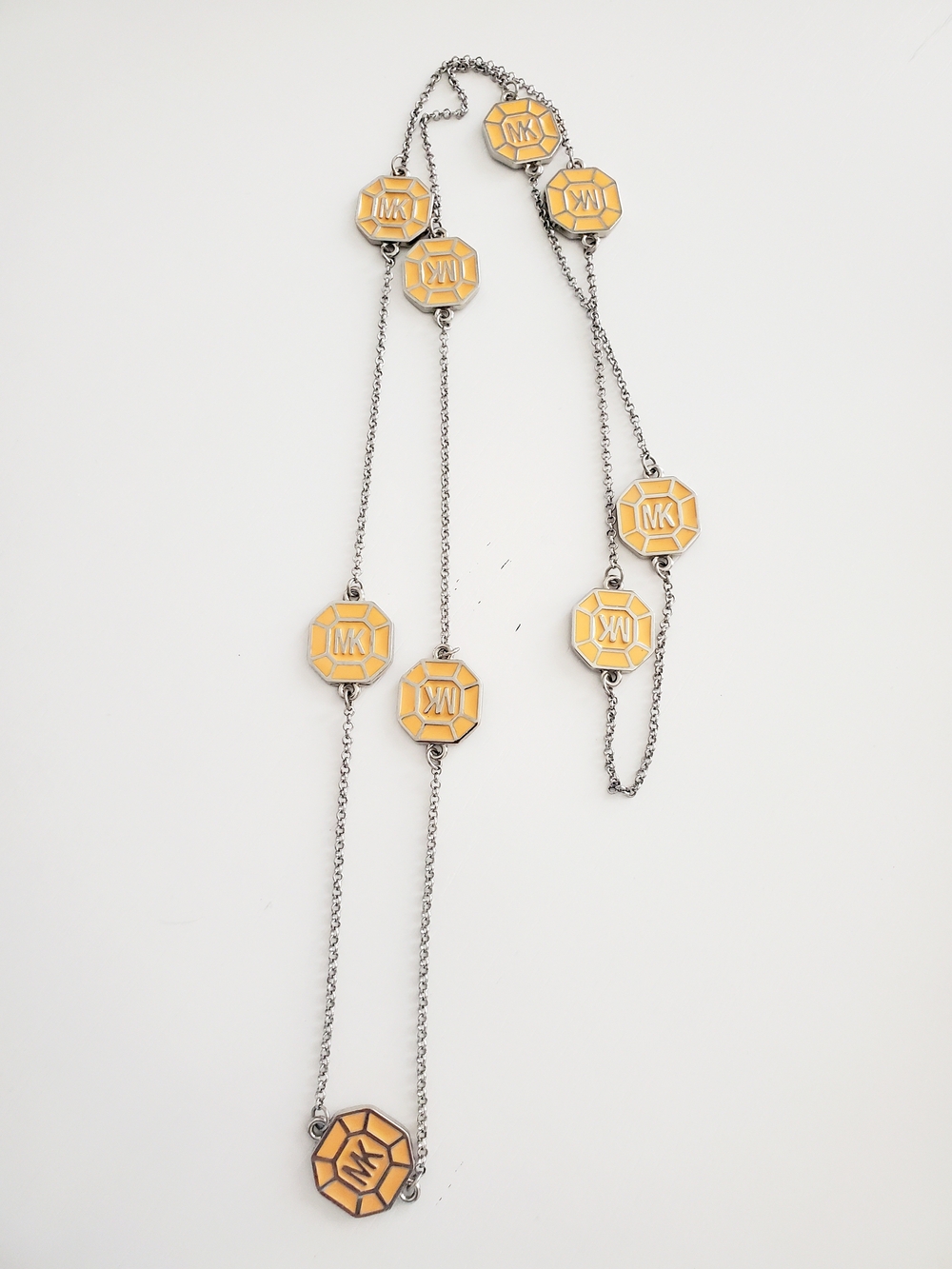 Michael Kors Silver-Tone Long Necklace with Orange Enamel Logo Stations